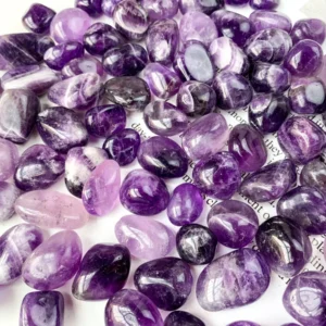Natural amethyst crystal stones in varied purple tones